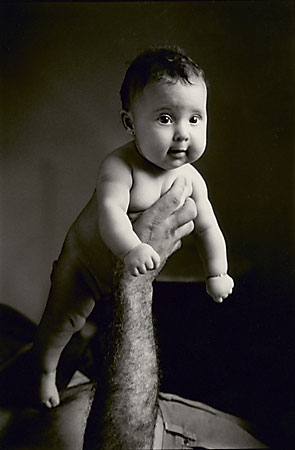 Father's hand and daughter. Original, Silver print 12"x9.5"